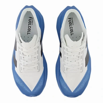 Mens New Balance 1906 Black New Balance Men's Fuel Cell Rebel v4 Everyday Running Shoe - Blue Laguna