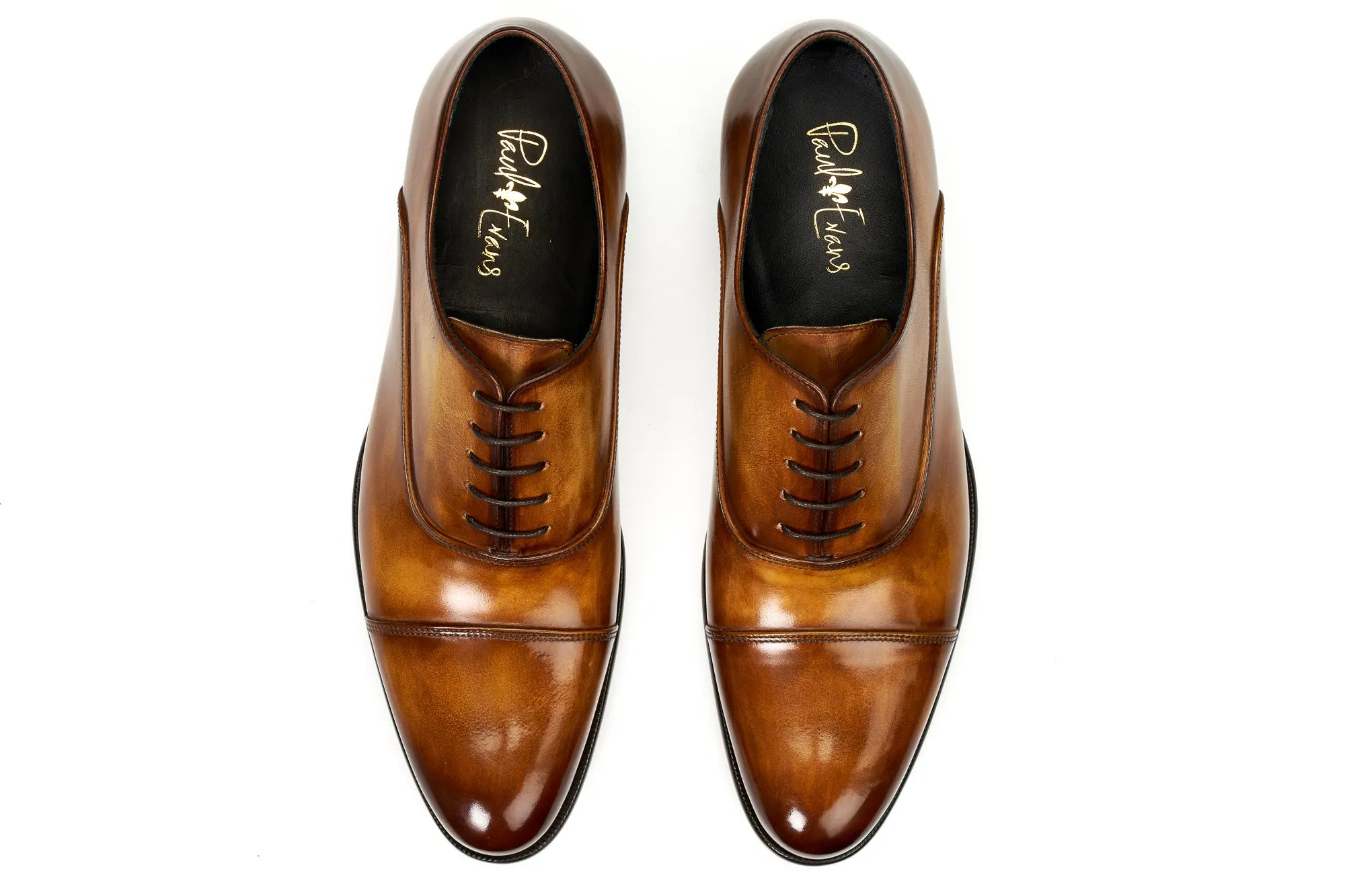 The Cagney II Stitched Cap-Toe Oxford - Tobacco Saddle Oxfords History